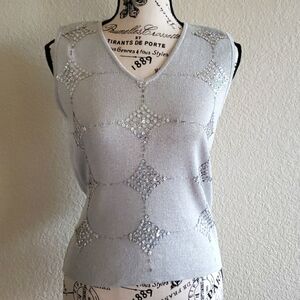Quest-ce Que C'est Sweater sleeveless vest